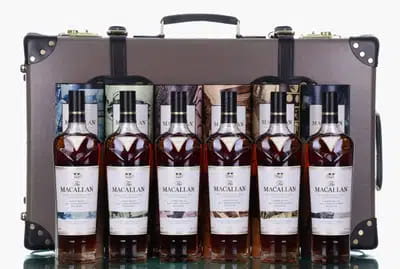 Macallan James Bond 60th Anniversary Release | Decades 1-6 & Globe-Trotter Suitcase With Prints For Auction