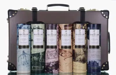 Macallan James Bond 60th Anniversary Release | Decades 1-6 & Globe-Trotter Suitcase With Prints For Auction